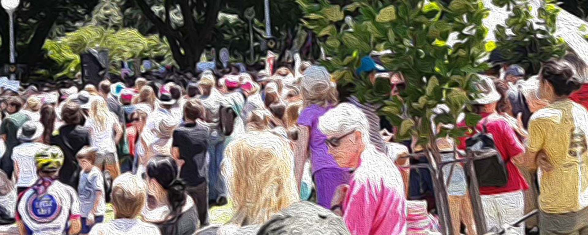 A crowd of protesters walk through Sydney