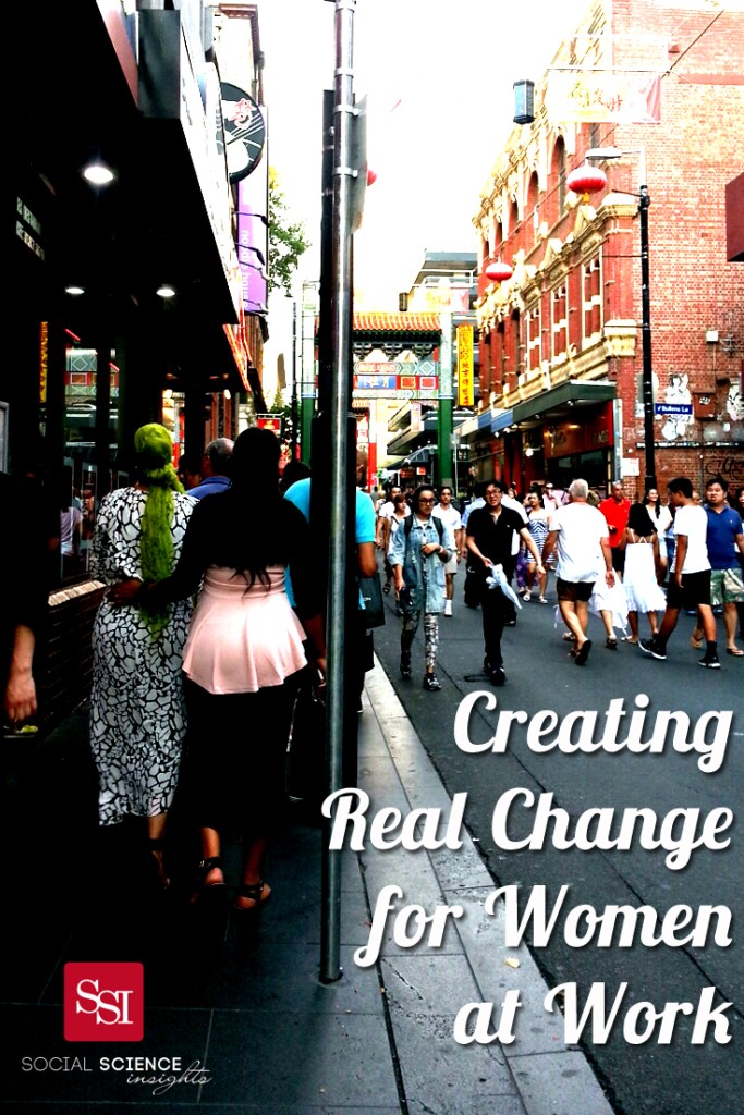 Women walk through a crowd in Chinatown, Melbourne. Text reads: Creating real change for women at work