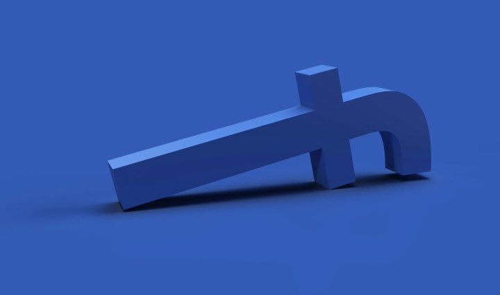 The Facebook logo fallen over against a blue background