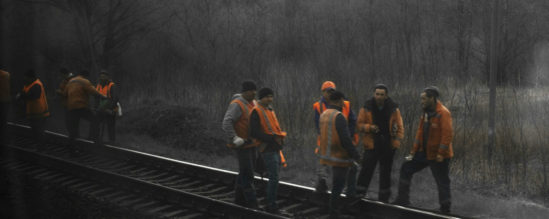 Men work on a train track