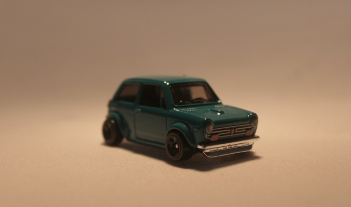 A model of a miniture green car