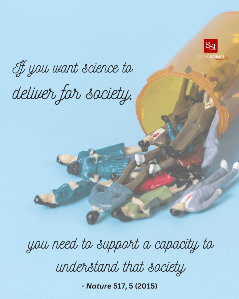 Miniture model people spill out of a pill bottle