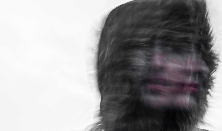 Artistic drawing showing a person's face in a haze