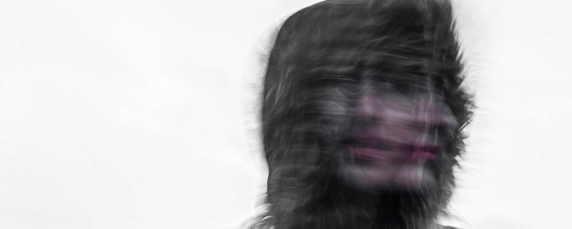 Artistic drawing showing a person's face in a haze