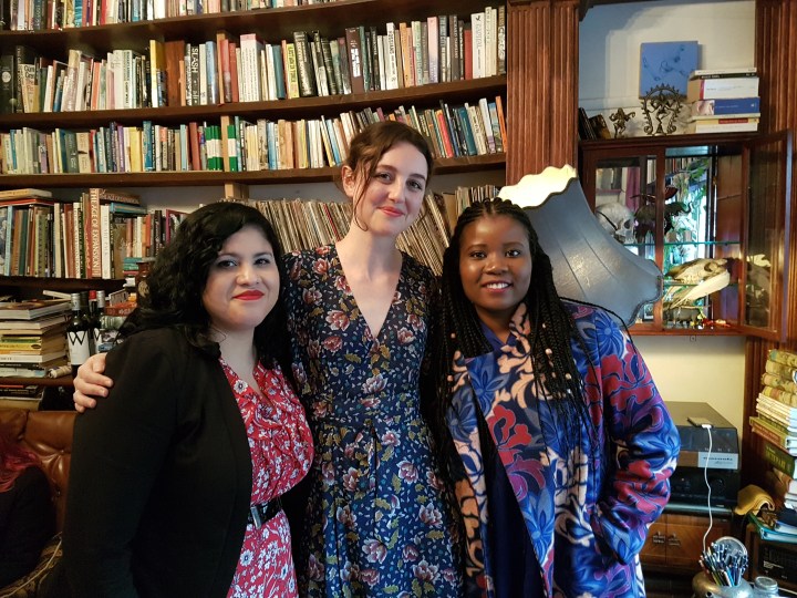 Zuleyka is a Latin woman wearing a black jacket and red dress. Kaila is a all white woman wearing a blue floral dress. Santilla is a Zambian woman wearing a blue jacket