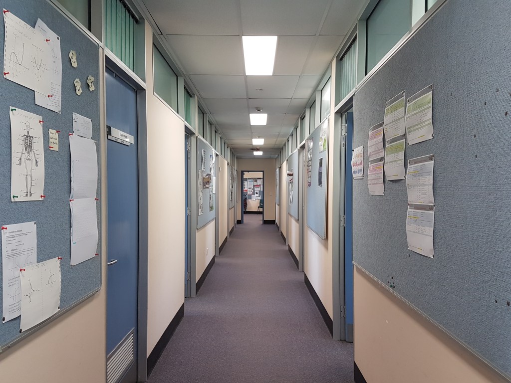 A corridor showing notices