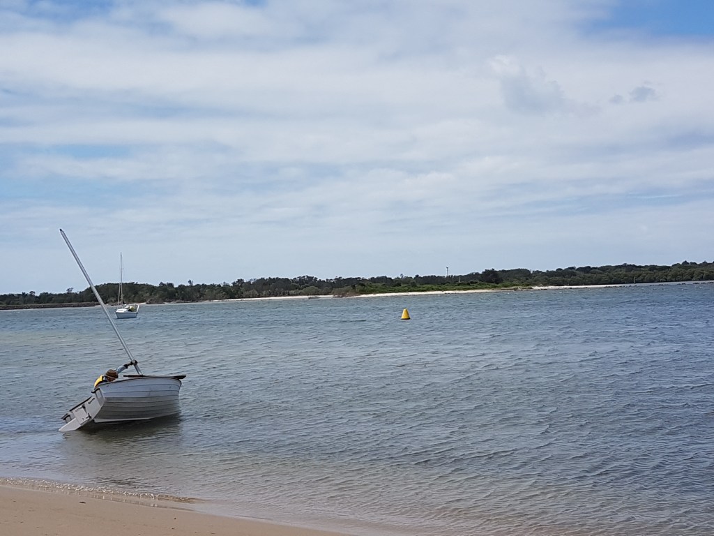 Abandoned, small boat at a beach