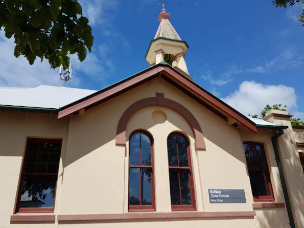 Ballina Court House is a cream coloured building with an ornate tower on the roof