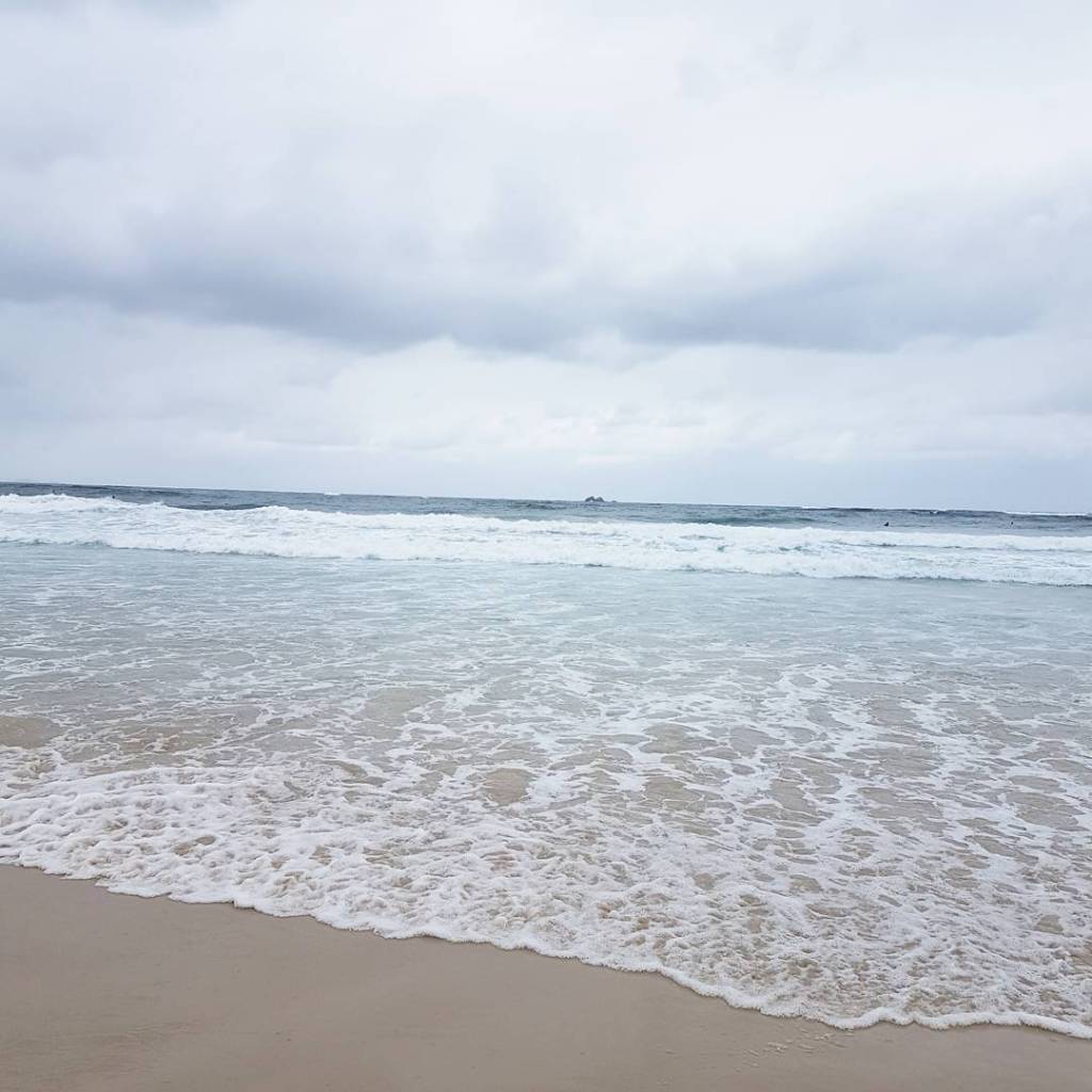 Waves at the shore of a beach