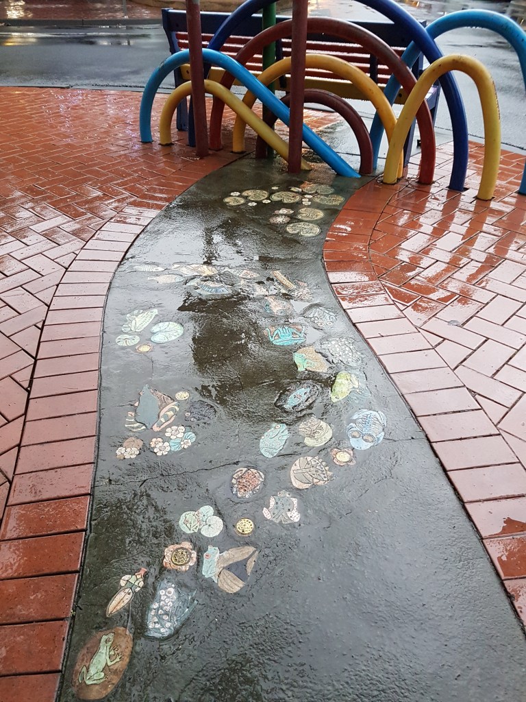 Children's drawing decorate the pavement