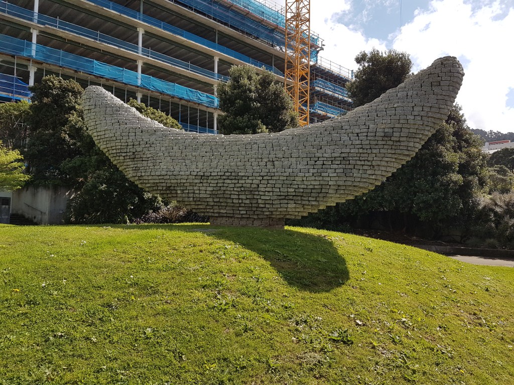 Gigantic silver-panel sculpture in the shape of a banana