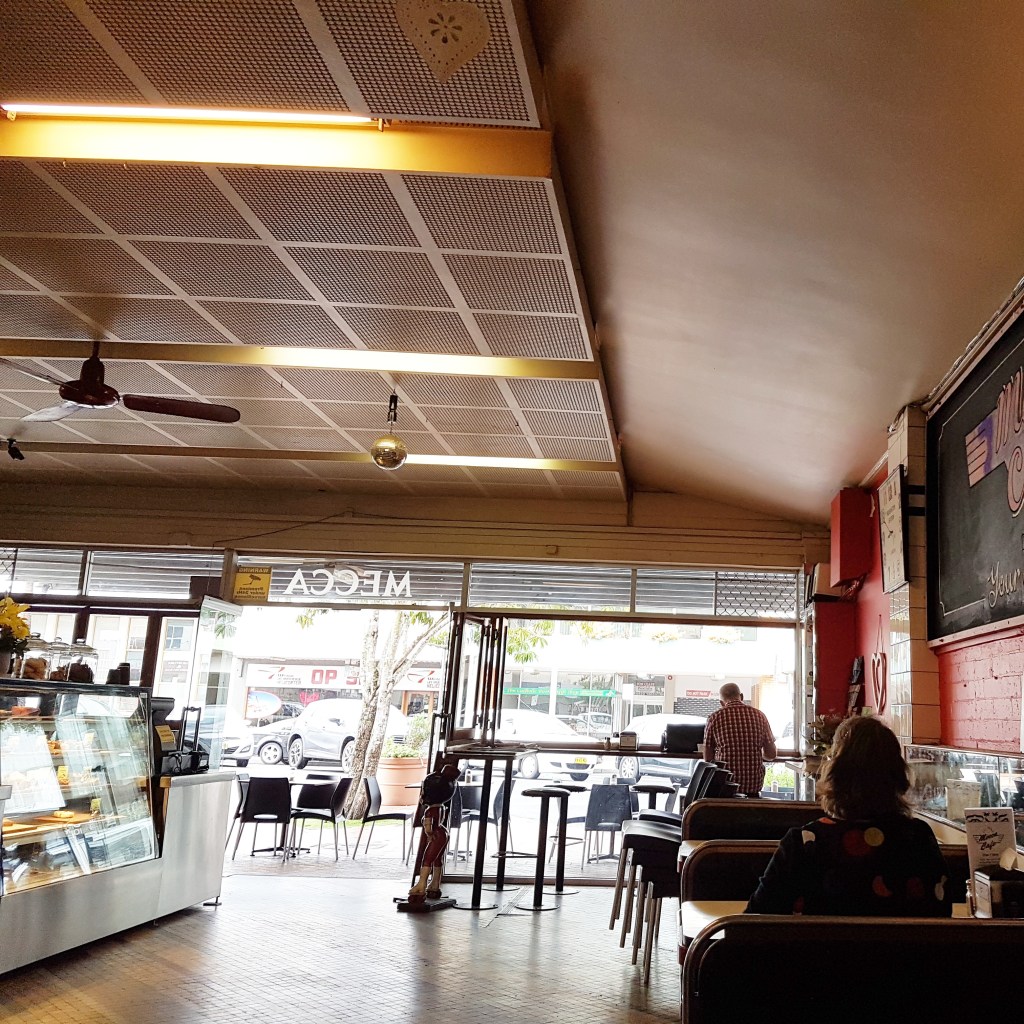 People seen from the back, eating in a cafe in rural New South Wales