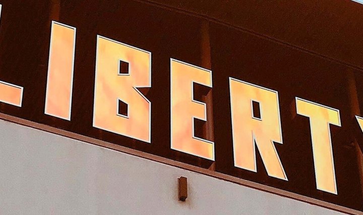 Sign on a building reads: Liberty