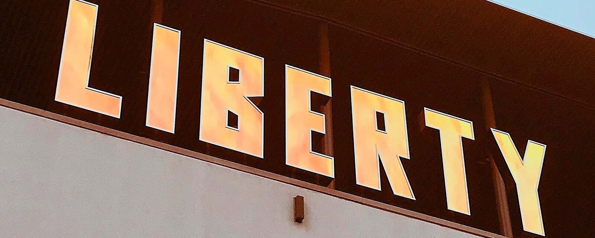 Sign on a building reads: Liberty