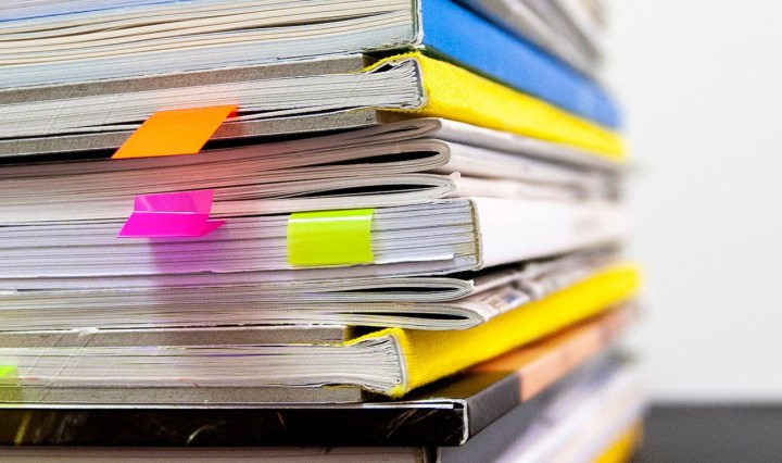 Stack of papers and reports