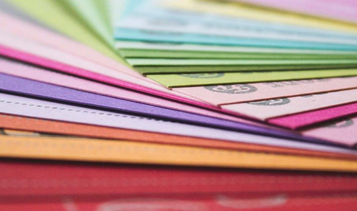 Stack of brightly coloured papers