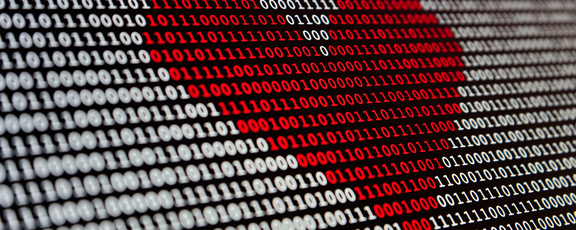 Red love heart over binary code