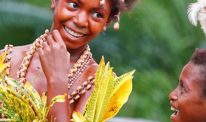Two young Black girls Performers in a Sing Sing in Papua New Guinea