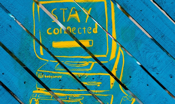 Blue boards with a drawing of an old computer. Text says: Stay conected