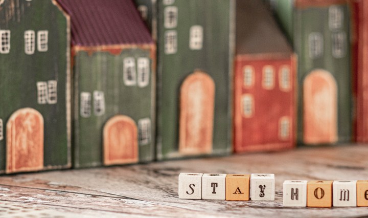 Drawings of houses with letter blocks that spell out: Stay home