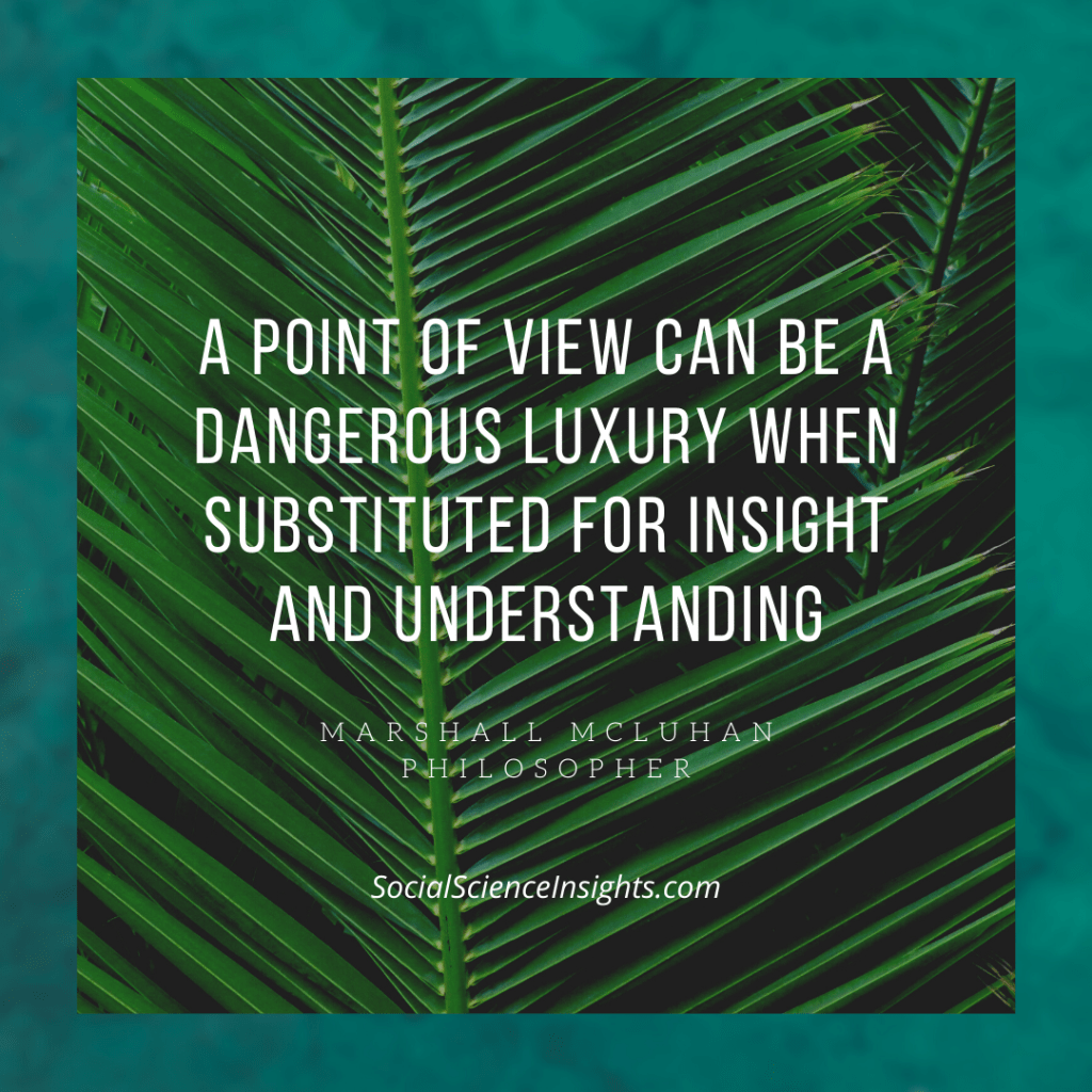 Leaves in the background, with Marshall McLuhan quote overlaid