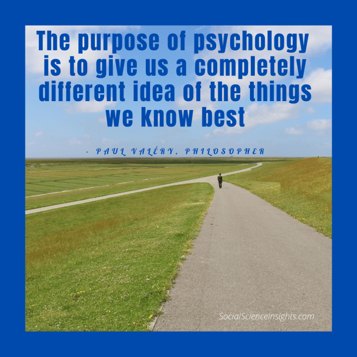 An open field with a road stretching into the distance. A person walks in the background. Quote at the top, by Paul Valery. "The purpose of psychology"