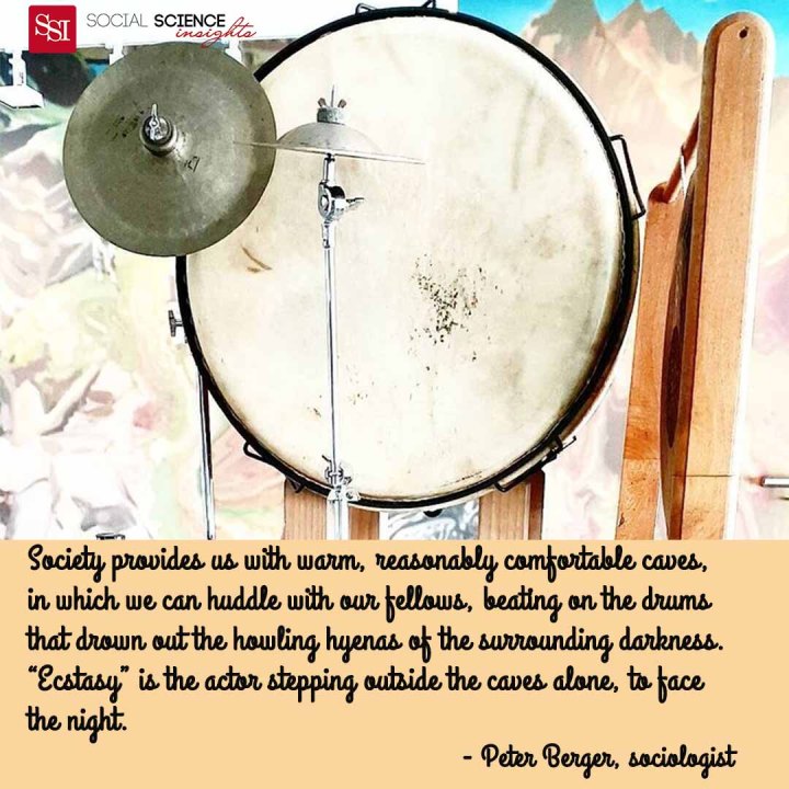 A beautiful white drum suspended. Quote: Society provides us with warm, reasonably comfortable caves, in which we can huddle with our fellows, beating on the drums that drown out the howling hyenas of the surrounding darkness. “ecstasy” is the actor stepping outside the caves alone, to face the night.