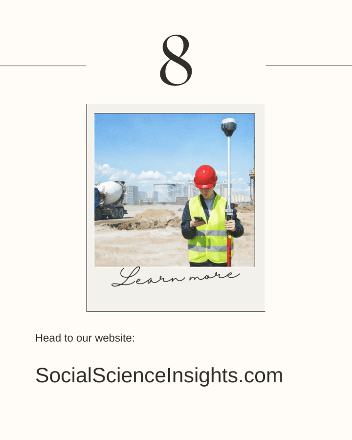 An Asian man looks at his phone at a construction site