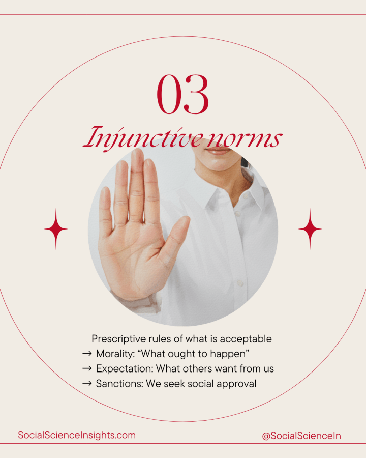 A white woman holds her hand out as if saying, 'Stop'